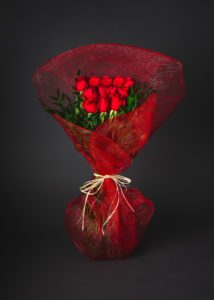 wrapped red roses