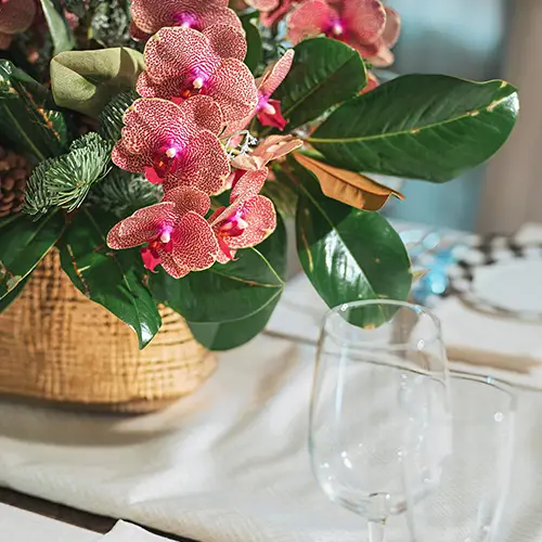 Corporate Flower Subscriptions arrangement on table setting